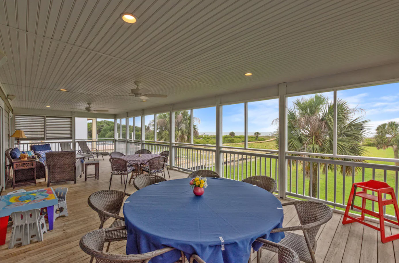 Screened porch with ocean breeze at Isle of Palms vacation rental